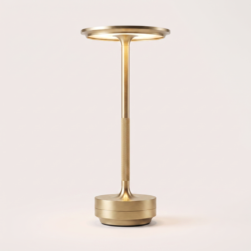 Eclara Ilumina cordless table lamp in brushed gold, flat disc head with warm LED, knurled stem and stepped base