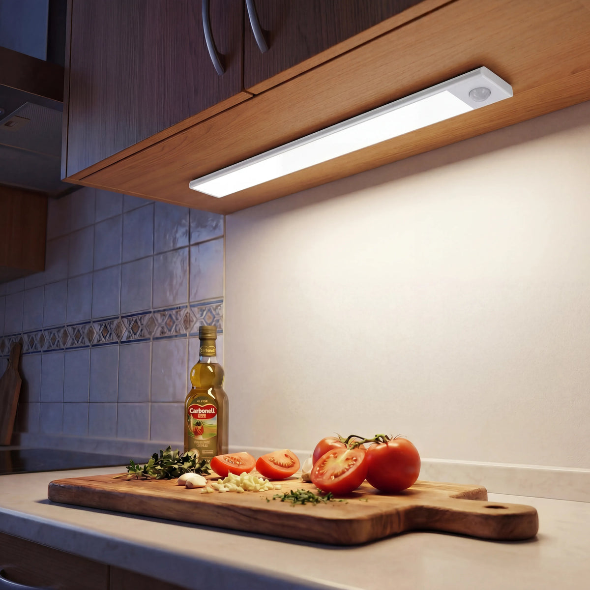 Ultra-thin ECLARA LED bar mounted under a kitchen unit, lighting a worktop with chopping board and spices